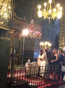 The bride and groom arrive at the altar